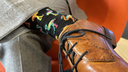 Markenzeichen: Christian hat ein Faible für bunte Motivsocken, um etwas Farbe in seine ansonsten pragmatisch-gedeckte Garderobe zu bringen.