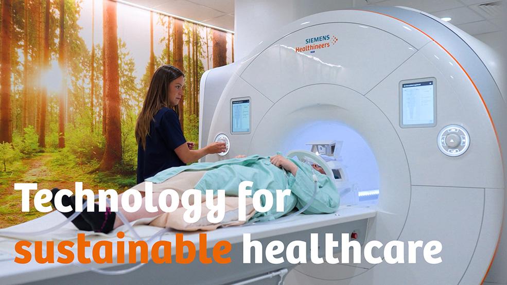 MRI exam: Patient is lying on gantry with a local head coil around their head. A radiologist moves the gantry into the bore using the panel on the sytem.