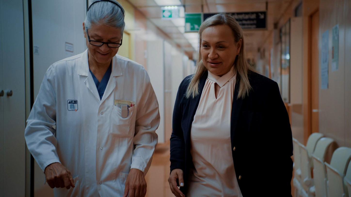 Patient walking with Dr. Lang