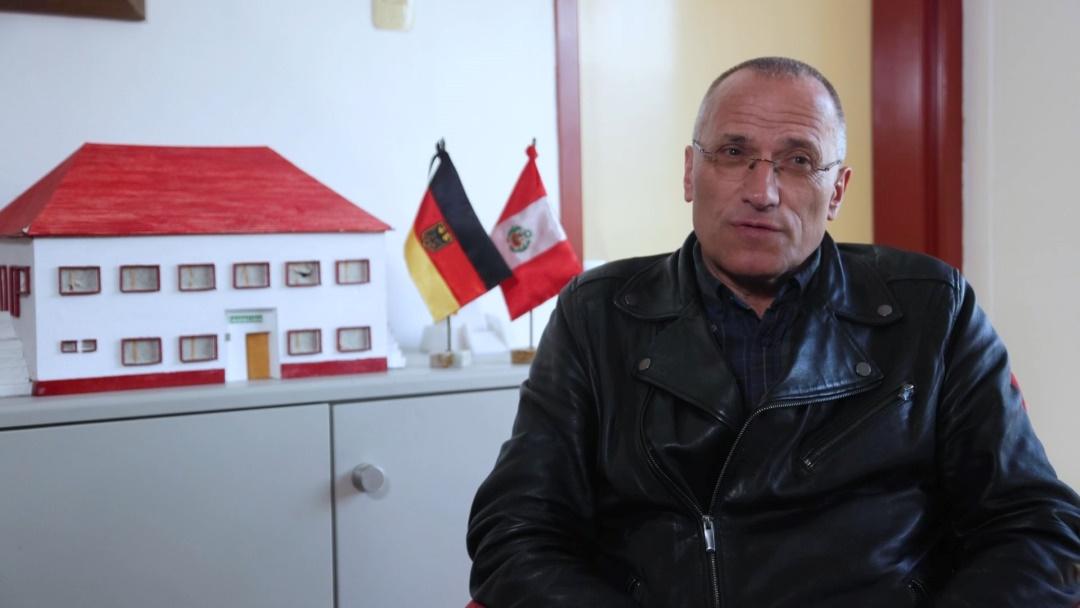 Klaus John, Founder of Diospi Suyana Hospital, in his office in Peru