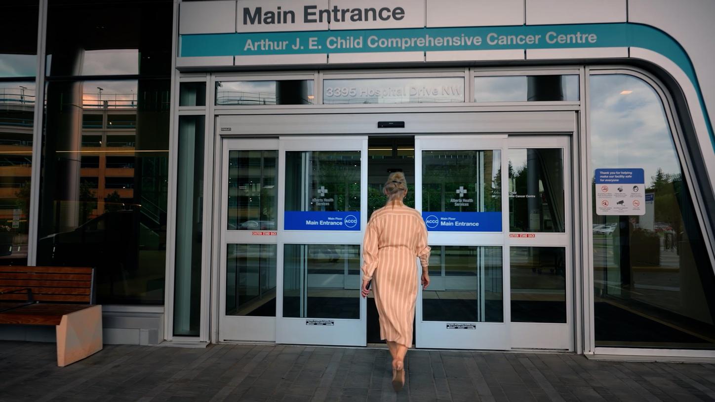 Brenda Hubley, Chief Program Officer at Cancer Care Alberta, entering the cancer care center