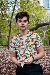 Anne's son Zane standing in a park